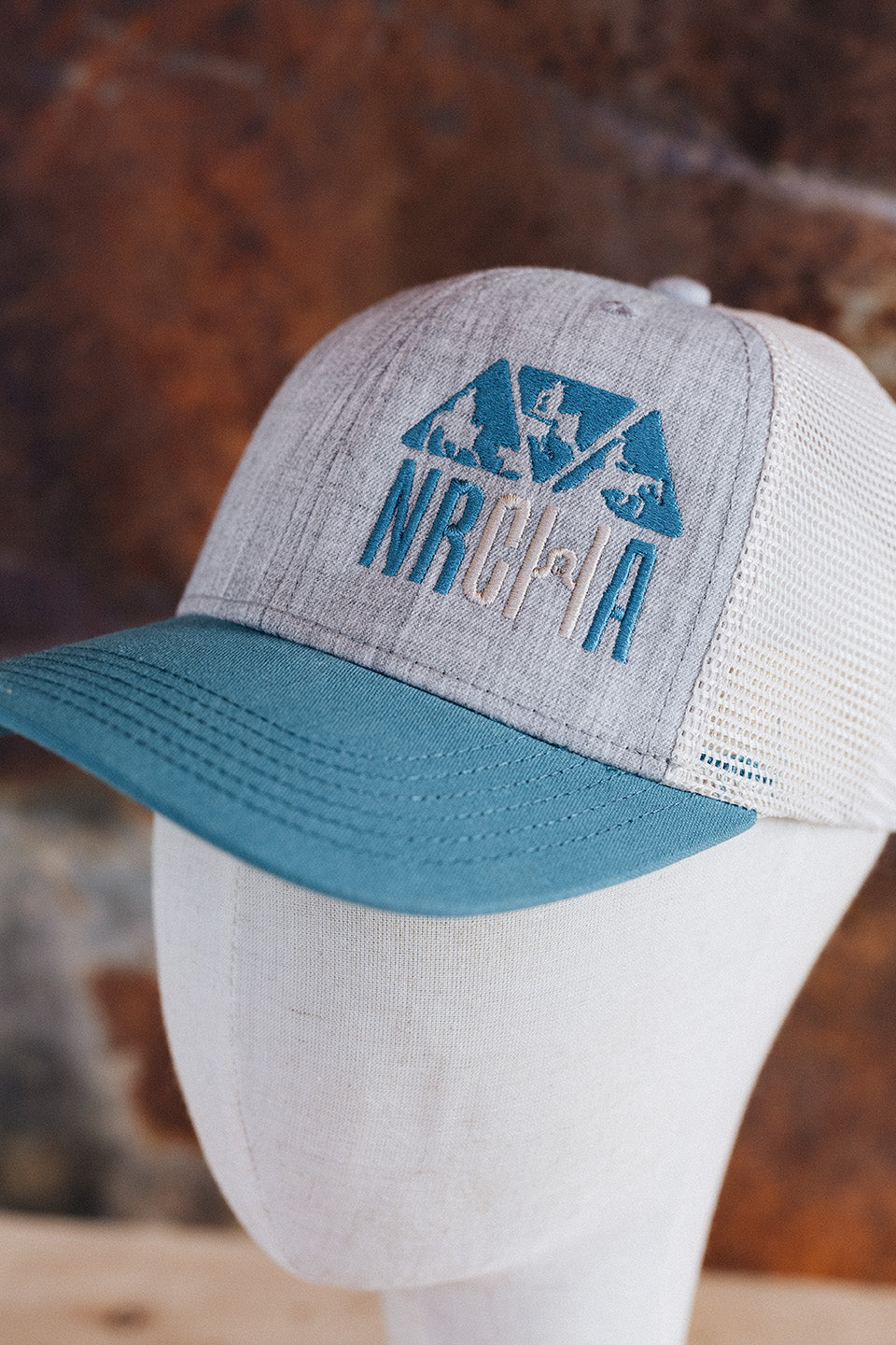 NRCHA Logo Light Grey, Turquoise & White Hat